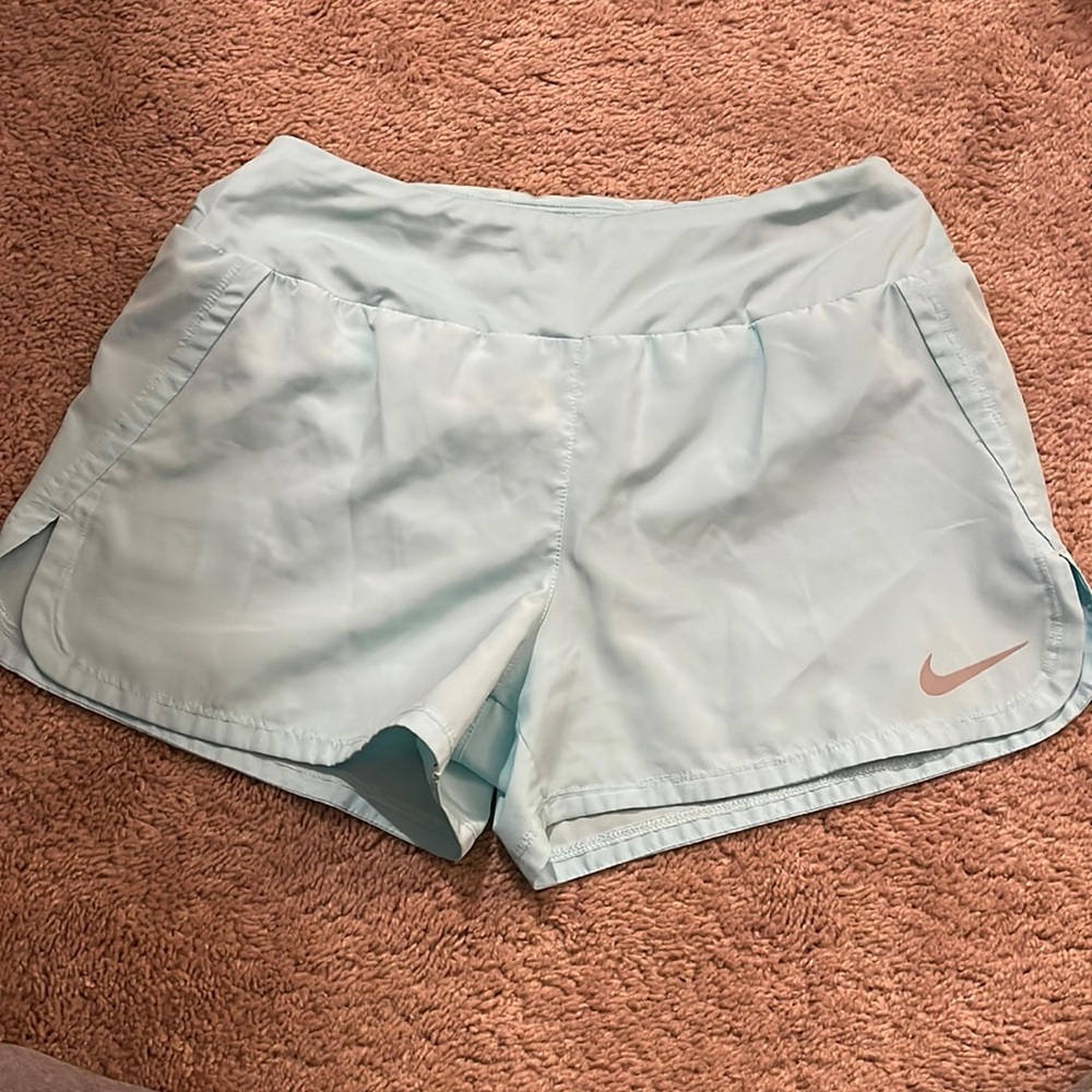Blue Nike shorts